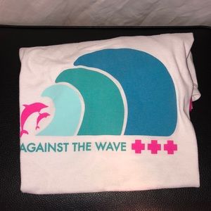Pink dolphin “against the wave” T-shirt